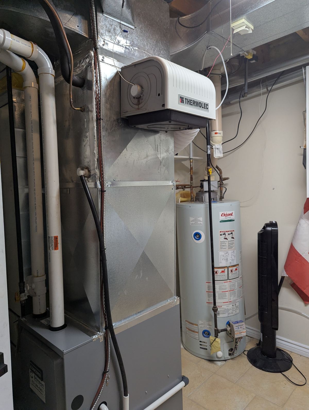 Furnace and Giant hot water tank installation in a utility room